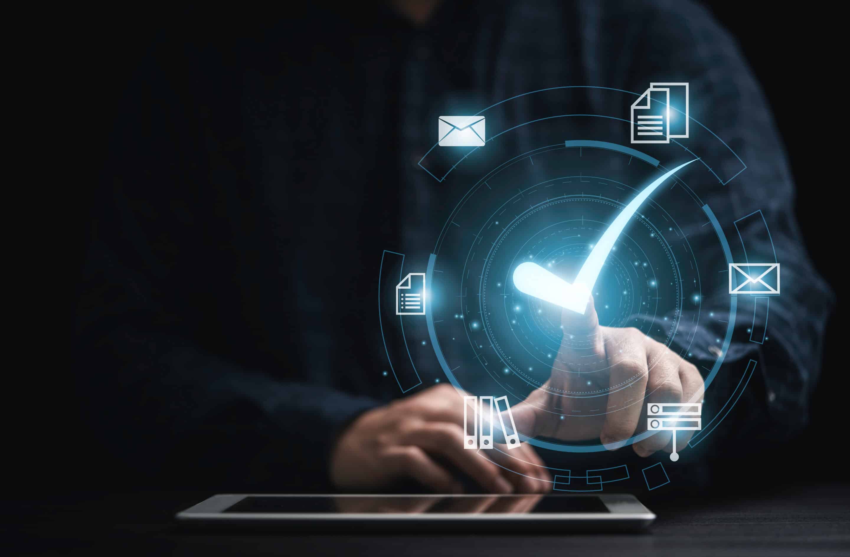 Businessman holding tablet with virtual document and mark correct sign for online approve paperless and quality assurance concept.